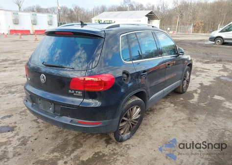 2014 Volkswagen Tiguan Sel z USA, uszkodzony, nr VIN WVGBV3AX3EW531961